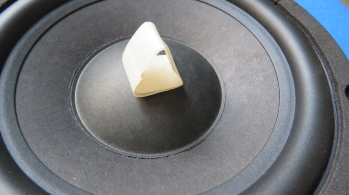 Speaker dust cap replacement - Fit the dust cap on the speaker cone and carefully remove the masking tape